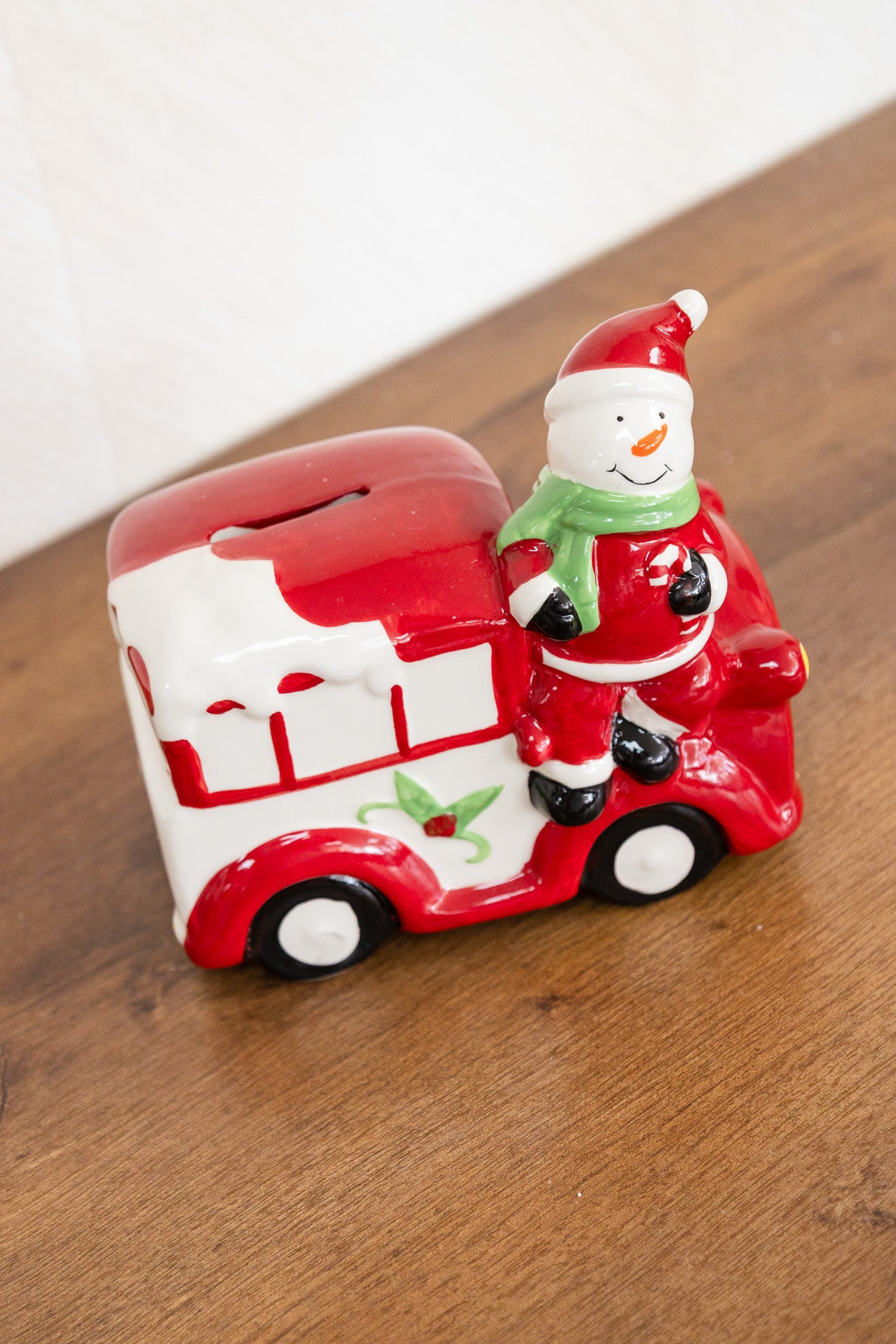 Carro alcancía navideño
